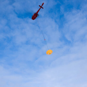 The Drop Test Vehicle for the LADT mission below the launch helicopter