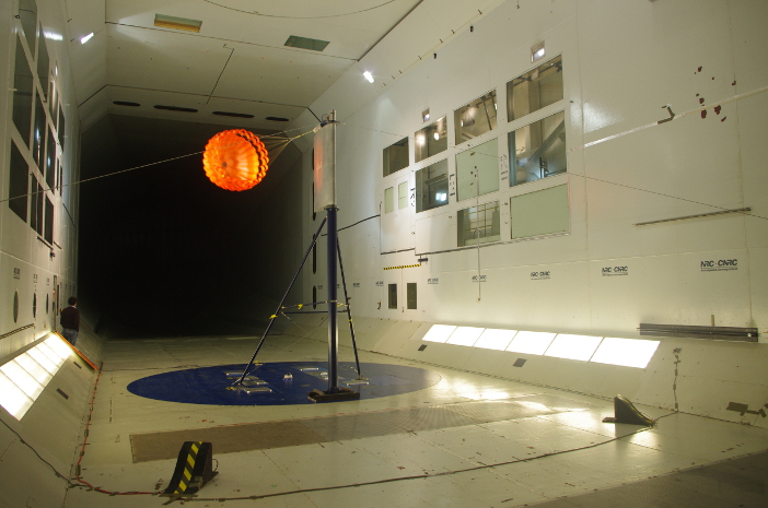 Testing a candidate design for a subsonic parachute to slow a future mission to Mars inside Canada’s National Research Council wind tunnel, in Ottawa 
